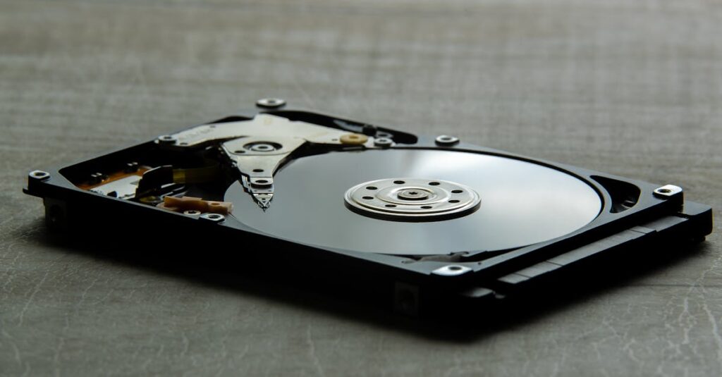 Mac Harddrive with cover off for repair at MacTek in Bend for data recovery procedure. 